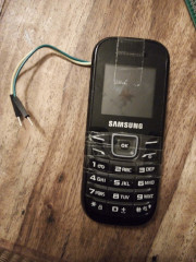 The phone with wires soldered to the speaker output